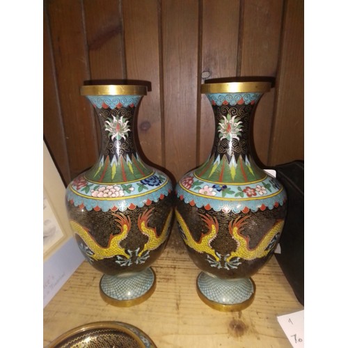 70 - A pair of Chinese cloisonne vases decorated with dragons, together with matching dish.