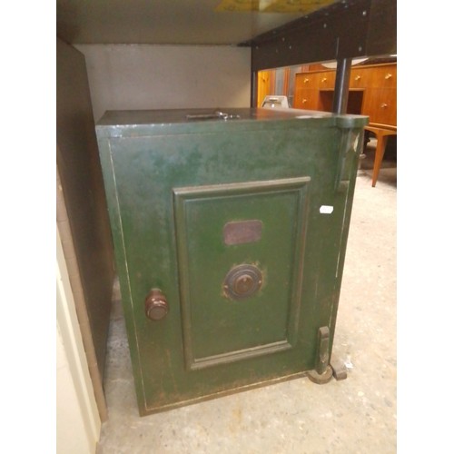 283 - An antique Morton & Co safe.