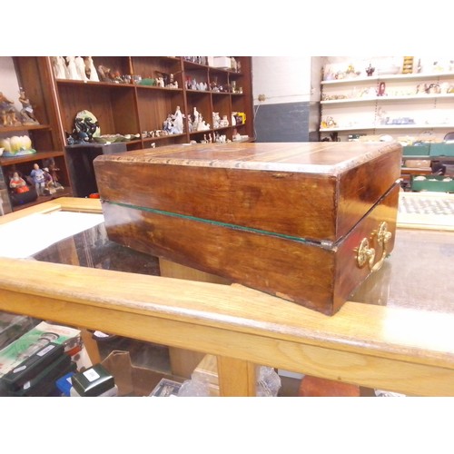 56 - A Victorian inlaid walnut writing box.