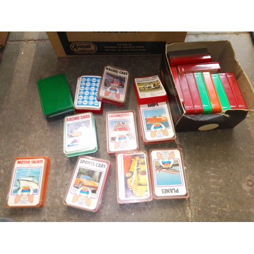 184 - 2 boxes of vintage toys, puzzles and boards games to include blue peter, racing car game, puppet, Sn... 