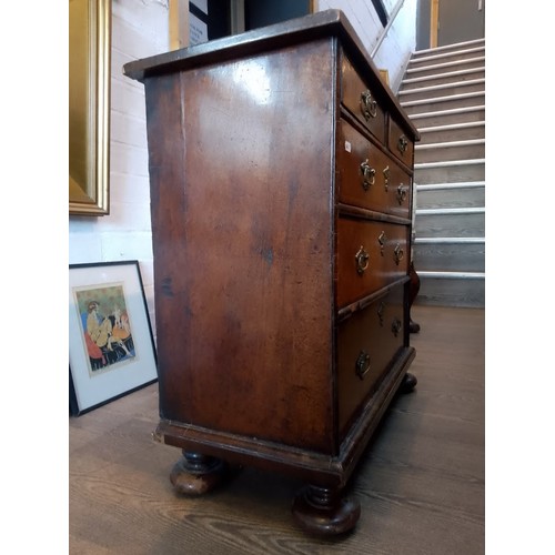 884 - A 17th century William and Mary figured walnut chest of drawers, circa 1690.