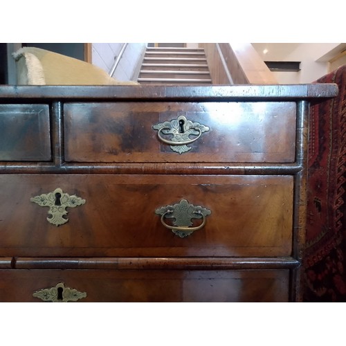 884 - A 17th century William and Mary figured walnut chest of drawers, circa 1690.