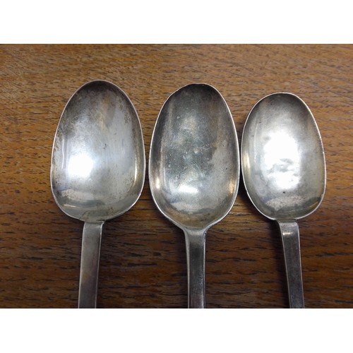 254 - A group of three silver trefid spoons, circa 1700, unascribed, length 18.5cm to 20cm, weight 152g.