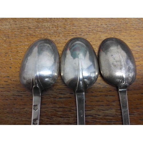 254 - A group of three silver trefid spoons, circa 1700, unascribed, length 18.5cm to 20cm, weight 152g.