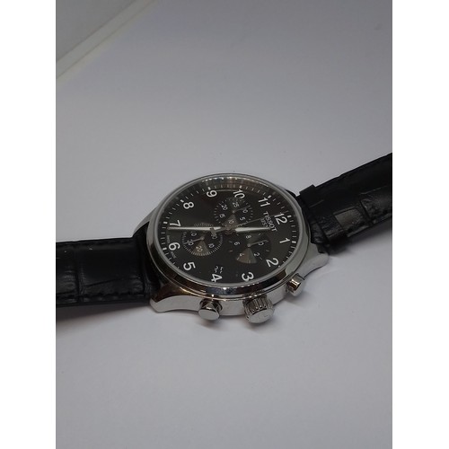 231 - A Tissot 1853 stainless steel quartz wristwatch, anthracite grey dial with three subsidiaries, case ... 