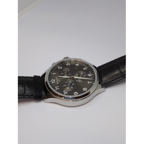 231 - A Tissot 1853 stainless steel quartz wristwatch, anthracite grey dial with three subsidiaries, case ... 