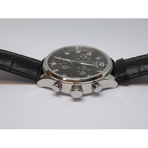 231 - A Tissot 1853 stainless steel quartz wristwatch, anthracite grey dial with three subsidiaries, case ... 