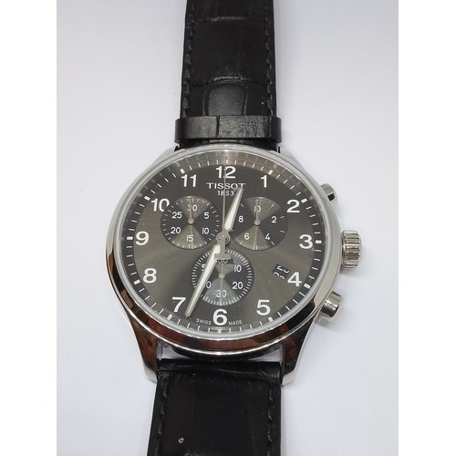 231 - A Tissot 1853 stainless steel quartz wristwatch, anthracite grey dial with three subsidiaries, case ... 