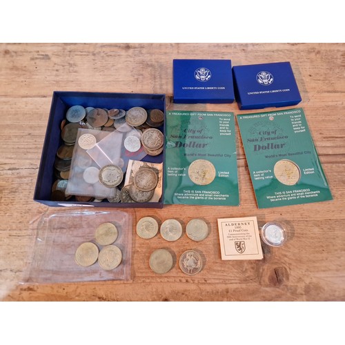 447 - A box of assorted coins to include collectable £2 coins, a 1995 £1 silver proof coin & some silver c... 