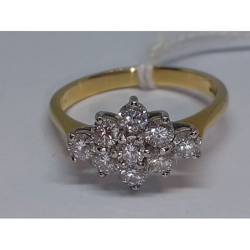 84 - A diamond cluster ring, nine round brilliant cut diamonds weighing approx. 1ct in total, hallmarked ... 