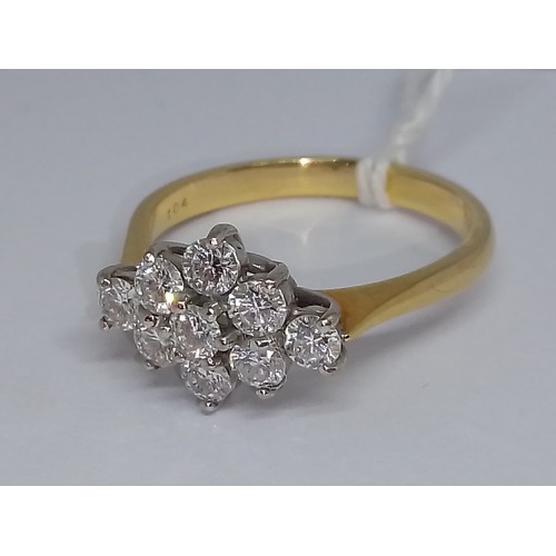 84 - A diamond cluster ring, nine round brilliant cut diamonds weighing approx. 1ct in total, hallmarked ... 