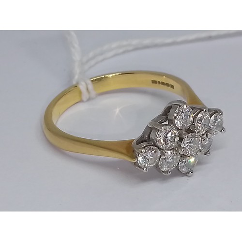 84 - A diamond cluster ring, nine round brilliant cut diamonds weighing approx. 1ct in total, hallmarked ... 