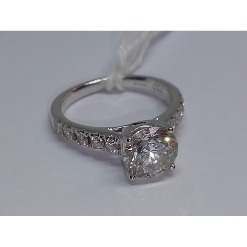 171 - A diamond solitaire ring, the principal four claw set round brilliant cut stone weighing approx. 1.5... 