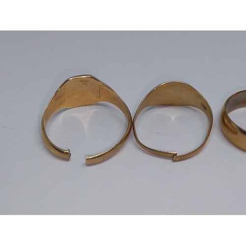 91 - Two hallmarked 9ct gold rings and another unmarked,, gross weight 9.6g.