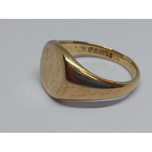 110 - A hallmarked 9ct gold signet ring, weight 6.4g, size R.