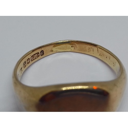 110 - A hallmarked 9ct gold signet ring, weight 6.4g, size R.