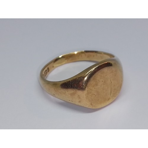 110 - A hallmarked 9ct gold signet ring, weight 6.4g, size R.