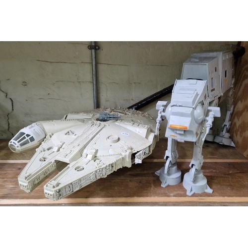 163 - Two vintage Star Wars vehicles comprising Millenium Falcon & an AT-AT.