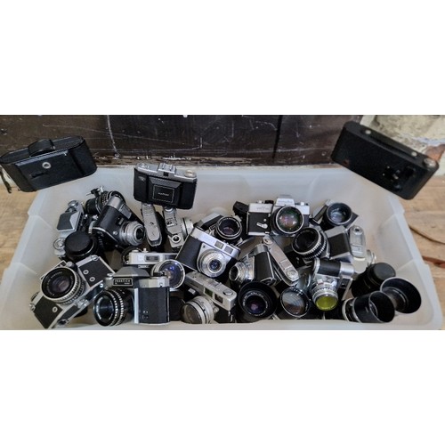 144 - A box of assorted vintage caneras & lenses to include a no. 2a folding autographic brownie, A Zeiss ... 