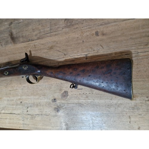 153 - An antique percussion rifle, stamped 'TOWER 1870' and crown to side plate, length 124cm.