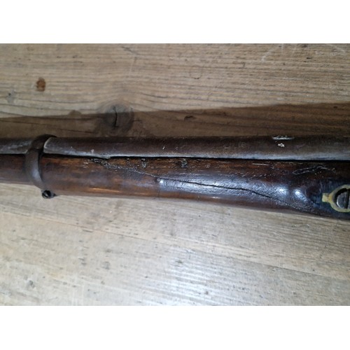 153 - An antique percussion rifle, stamped 'TOWER 1870' and crown to side plate, length 124cm.