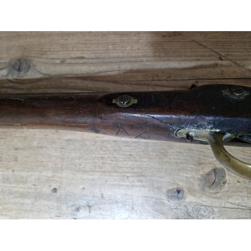 153 - An antique percussion rifle, stamped 'TOWER 1870' and crown to side plate, length 124cm.