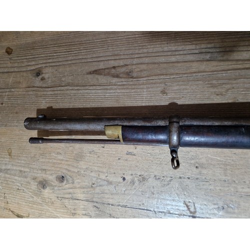 153 - An antique percussion rifle, stamped 'TOWER 1870' and crown to side plate, length 124cm.