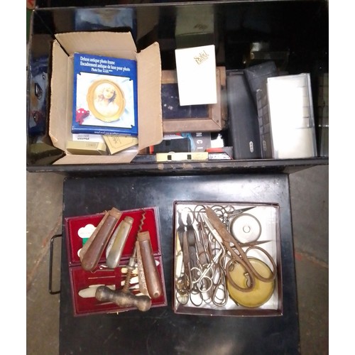 72 - Two deed boxes, one containing small solid brass photo frames, scissors, knives, pyrography kit, etc... 