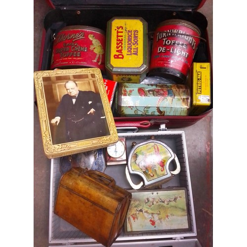 73 - Two cases of vintage tins including Huntley & Palmers, Rowntree, Bassett's, etc.