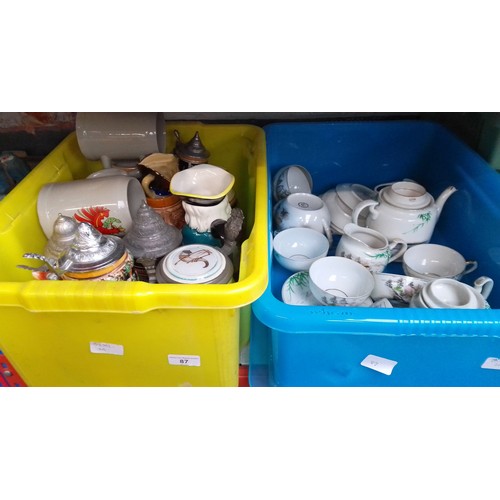 87 - Two boxes of assorted German steins, toby jug, a Japanese tea set etc.