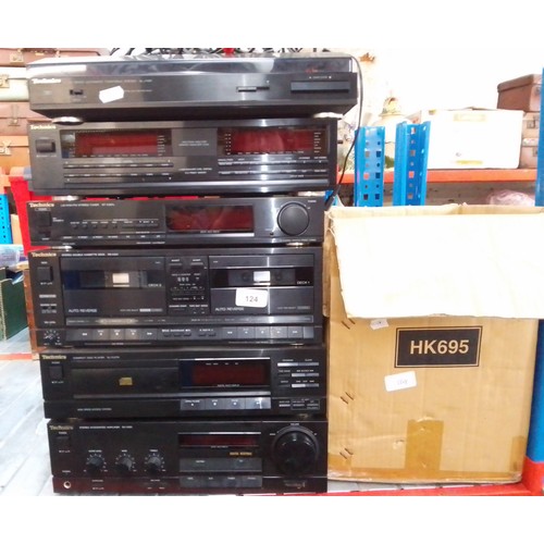 124 - A Technics stackable system; record deck, graphic equalizer, stereo tuner, CD player, integrated amp... 