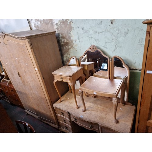 910 - A suite of bur walnut bedroom furniture by Beresford & Hicks comprising wardrobe, dressing table, be... 