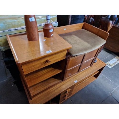 916 - A Nathan teak telephone seat together with a teak TV stand/record cabinet.