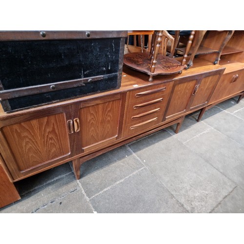 920 - A mid 20th century G Plan teak sideboard.