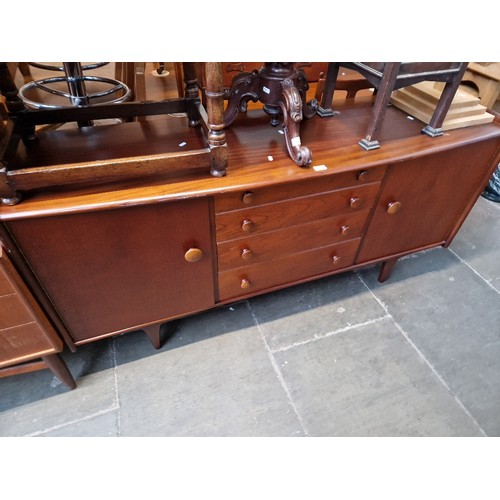 927 - A mid 20th century teak sideboard.