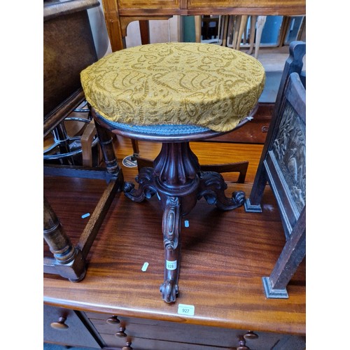 928 - A 19th century rosewood adjustable piano stool, a smokers stand & a mahogany toilet mirror.