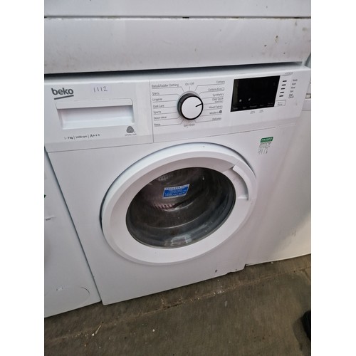 390 - A Beko washing machine.