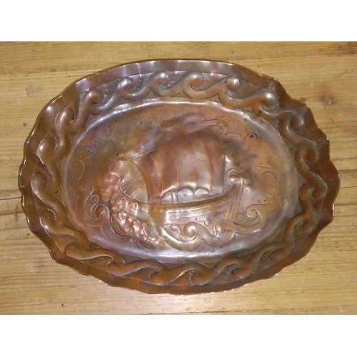 395 - An Arts & Crafts embossed copper dish decorated with a ship 'Moretta RTYC' (Royal Thames Yacht Club'... 