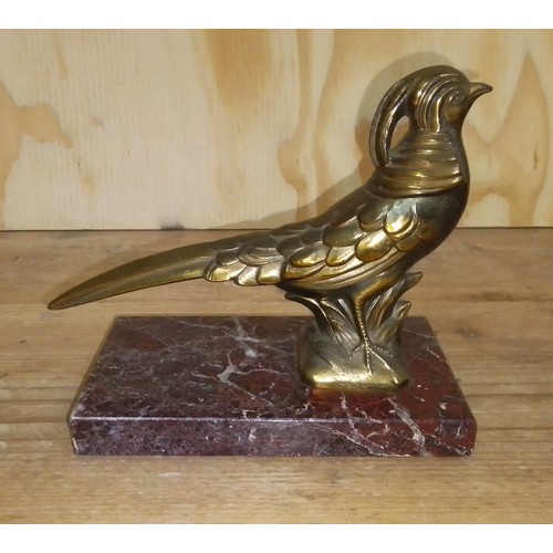 397 - An Art Deco bronzed bird and marble paperweight, length 18cm.