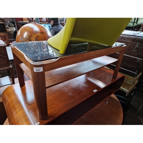 937 - A mid 20th century teak and smoke glass coffee table.