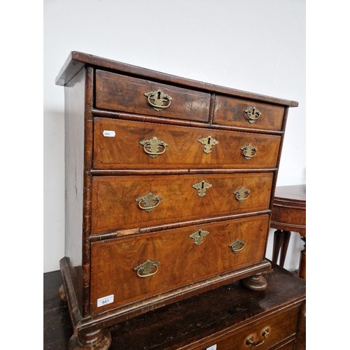 941 - A 17th century William and Mary figured walnut chest of drawers, circa 1690.