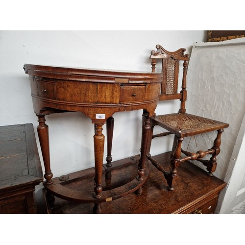 944 - A walnut demi-lune card table or credence table, circa 1700, with fold over top, three frieze drawer... 