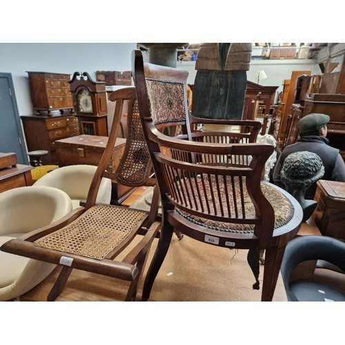 935 - An inlaid mahogany tub chair, together with a folding chair of a similar age.