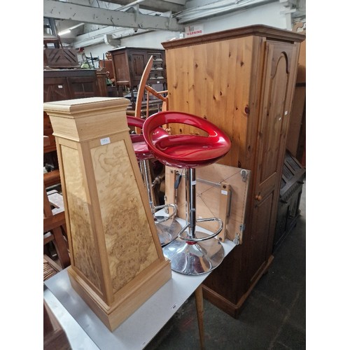 956 - A mixed lot comprising melamine top table, two kitchen bar stools, a wooden pedestal, a pine wardrob... 