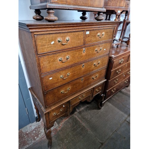 942 - An 18th century oak chest on stand.