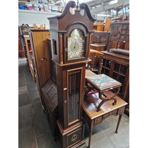 958 - A reproduction long case clock complete with weights and pendulum.