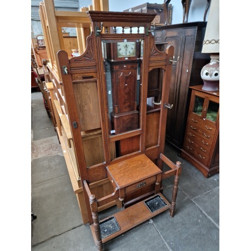 963 - An Edwardian oak hall stand.