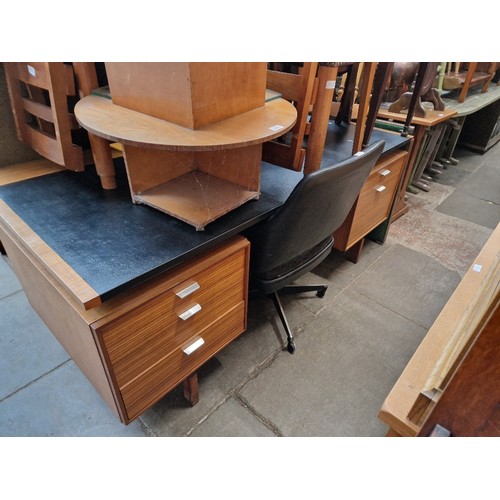 967 - A mid 20th century desk, designed by Herbert Berry for Lucas Furniture together with matching swivel... 