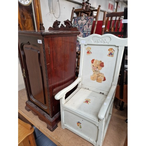 999 - A bedside cabinet, a rocking chair, a rush seated chair and a child's commode chair.