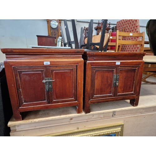 1001 - Two Chinese elm cabinets.